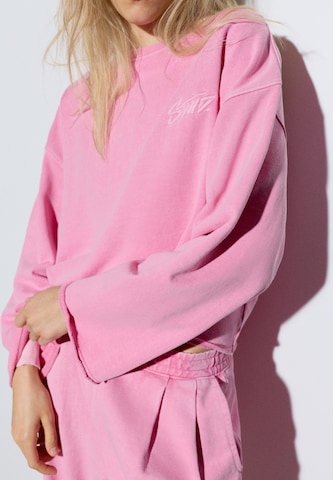 Bluză de molton de la Pull&Bear pe roz