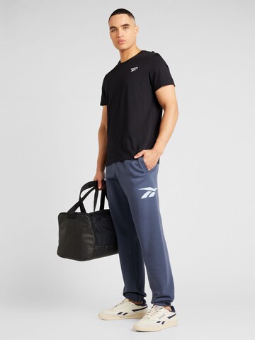 Effilé Pantalon Reebok en bleu