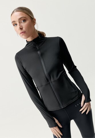 Born Living Yoga Skinny Trainingsjack 'Ivet' in Zwart: voorkant