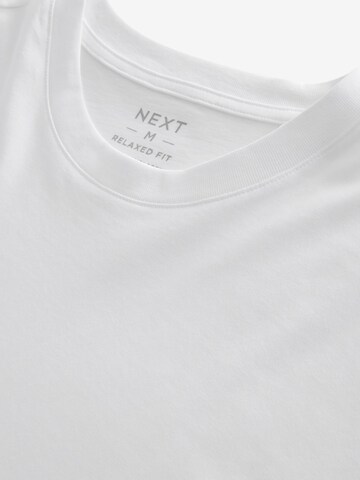 T-Shirt Next en blanc