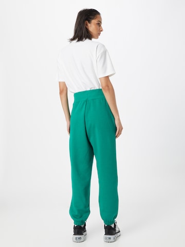 Nike Sportswear Tapered Pants 'Phoenix Fleece' in Green