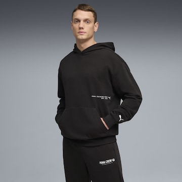 PUMA Sportsweatshirt in Zwart: voorkant