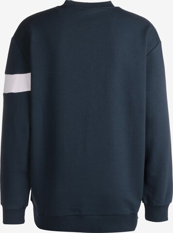 PUMA - Sweatshirt de desporto 'King' em azul