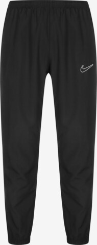 NIKE Tapered Workout Pants in Black: front