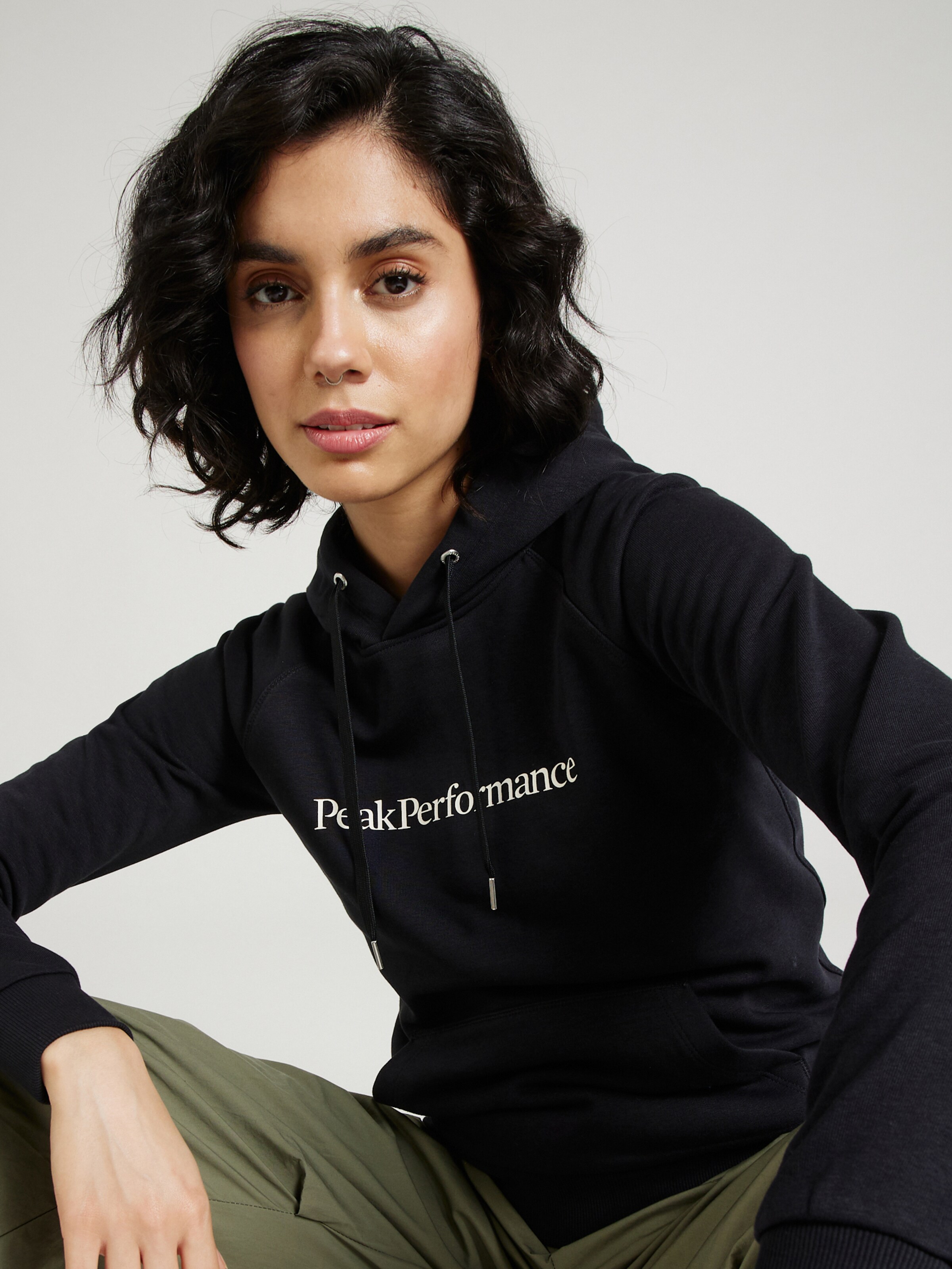 PEAK PERFORMANCE Athletic Sweatshirt Ground in Black ABOUT YOU
