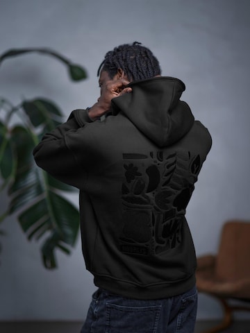 NOORLYS Sweatshirt 'PUNDIG'‌‌‌‌ in Schwarz