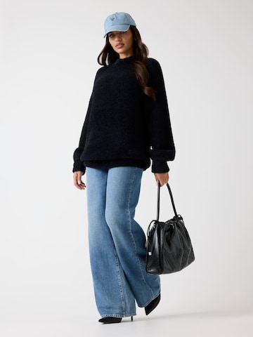 GUESS Pullover in Schwarz