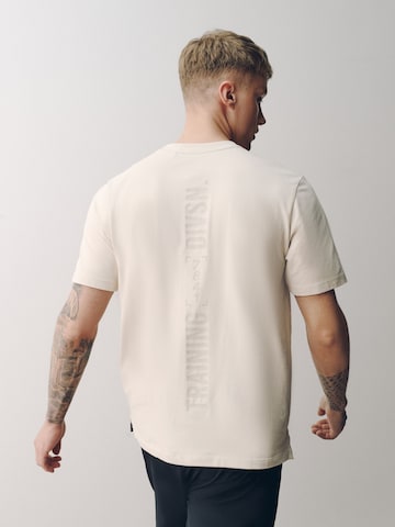T-Shirt 'Training Division' Next en beige : devant