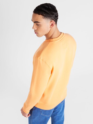 ALPHA INDUSTRIES Tréning póló 'Basic' - narancs