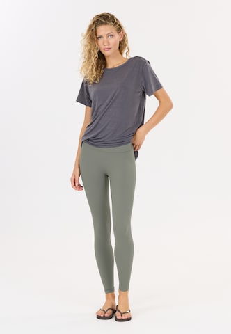 Athlecia Skinny Workout Pants 'Luxe' in Brown