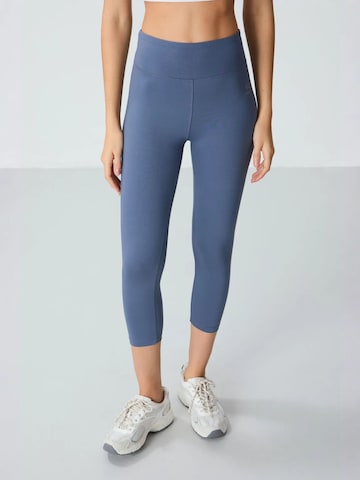 Coupe slim Leggings Tommy Life en bleu : devant