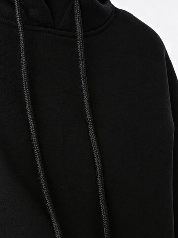 Sweat-shirt Ethiquet en noir