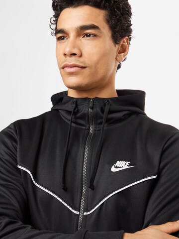 Nike Sportswear - Sudadera con cremallera 'Repeat' en negro