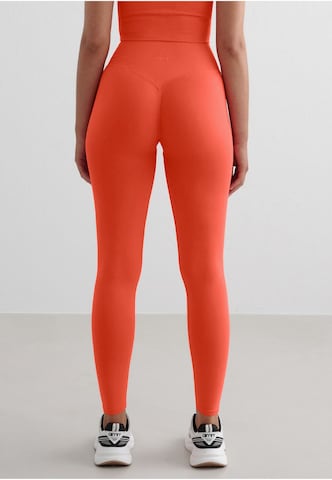 Skinny Pantaloni sportivi di Aim'n in rosso