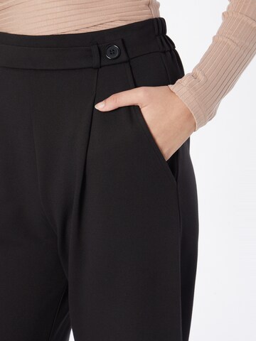 ABOUT YOU Loose fit Pleat-Front Pants 'Ingeborg' in Black