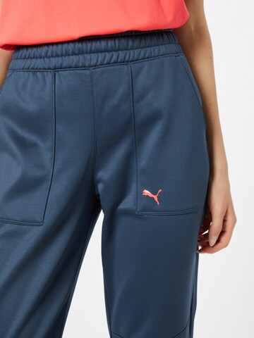 PUMA Tapered Sportbroek in Blauw