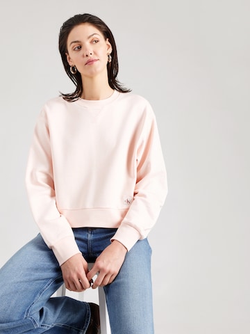 Bluză de molton de la Calvin Klein Jeans pe roz: față