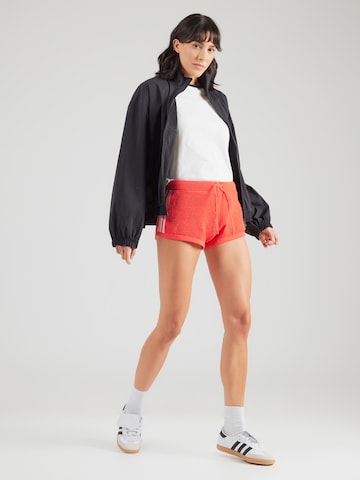 Regular Pantaloni de la ADIDAS ORIGINALS pe roșu