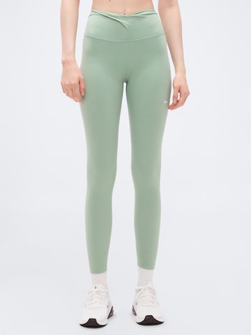 Skinny Pantalon de sport 'ONE' NIKE en vert : devant