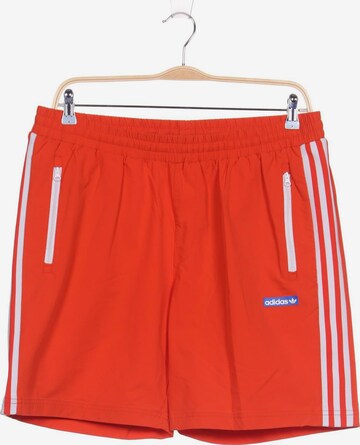 ADIDAS ORIGINALS Shorts in 35-36 in Orange: front