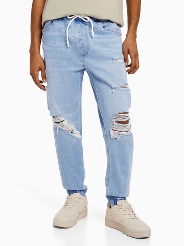 Tapered Jeans de la Bershka pe albastru: față