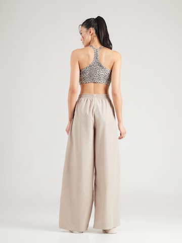 ADIDAS ORIGINALS Wide leg Trousers 'Firebird Adilenium' in Green