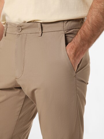 DRYKORN Slimfit Chinohose 'Ajend' in Beige