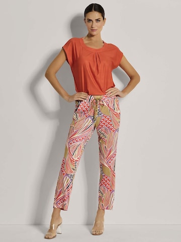 MADELEINE Regular Broek in Oranje