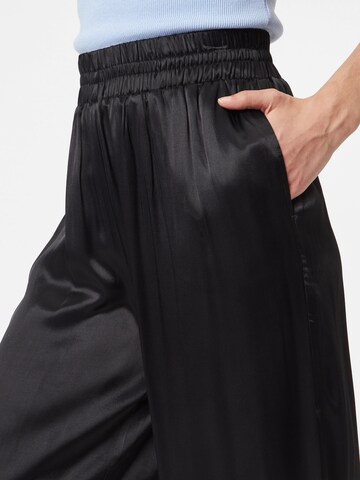 Wide leg Pantaloni di Warehouse in nero