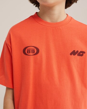 T-Shirt WE Fashion en orange