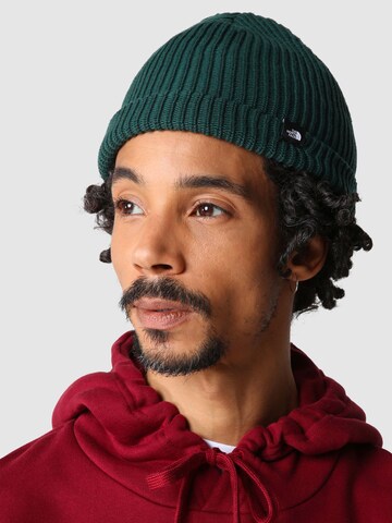 Căciulă de la THE NORTH FACE pe verde: față
