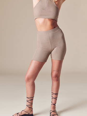 ABOUT YOU x Laura Giurcanu Skinny Leggings 'Jenny' in Brown: front