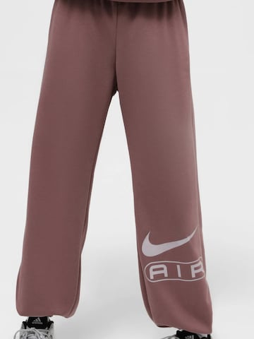 NIKE - regular Pantalón deportivo 'Nike Air Mid-Rise Fleece Jogger' en rosa