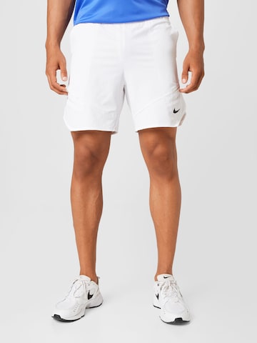 NIKE Regular Sports trousers in White: front