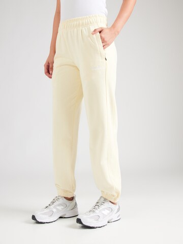 ELLESSE Tapered Pants 'LENTELLA' in Yellow: front