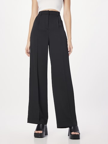 Calvin Klein - Perna larga Calças com vincos em preto: frente