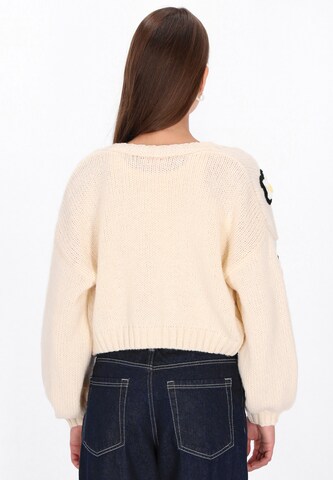 Cardigan swirly en beige