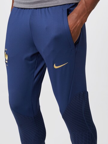 NIKE Skinny Sporthose in Blau