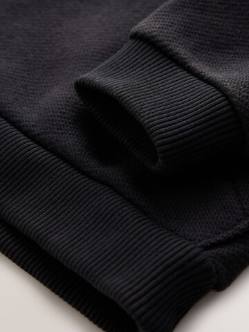 smALLSAINTS Sweater in Black