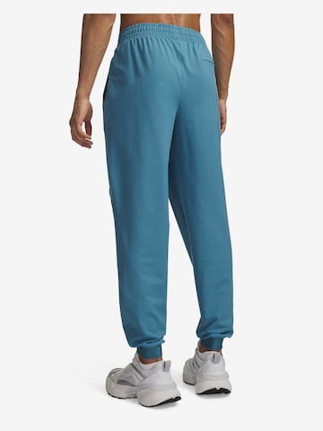 UNDER ARMOUR Sportbroek 'Unstoppable' in Blauw