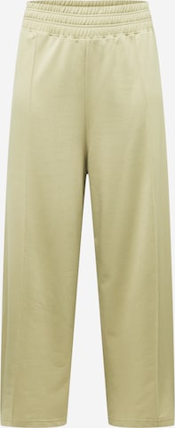Public Desire Curve Loose fit Pants in Green: front