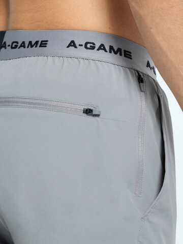 regular Pantaloni sportivi di A-Game in grigio
