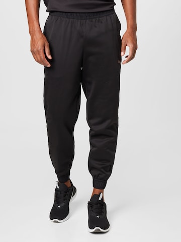 PUMA Дънки Tapered Leg Спортен панталон в черно: отпред