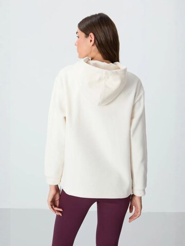 Sweat-shirt Tommy Life en blanc