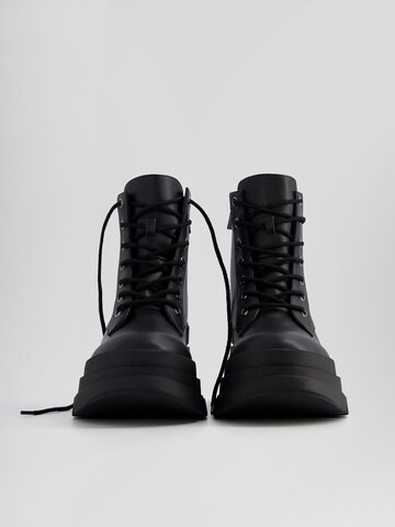 Bershka Lace-up bootie in Black