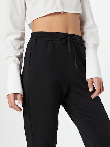 s.Oliver Tapered Trousers in Black