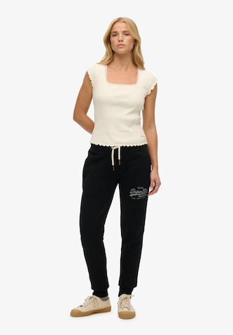 Superdry Tapered Trousers in Black: front