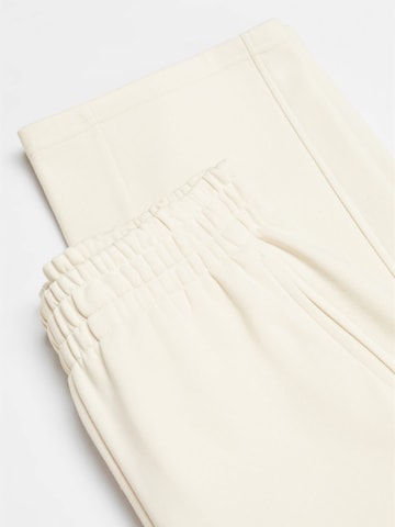 MANGO Szeroka nogawka Spodnie 'Toledo' w kolorze beżowy