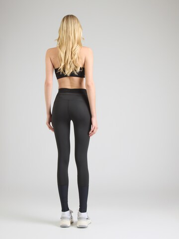 Skinny Pantaloni sport 'Core Impulse' de la MIZUNO pe negru