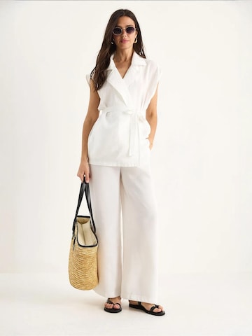 Pantalons de tailleur Bianco Lucci en blanc